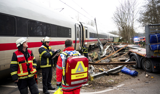 Twelve people injured in train-truck crash in Germany