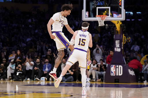 Austin Reaves joins Lakers legends after scoring 45 points in a standout game against the Pacers