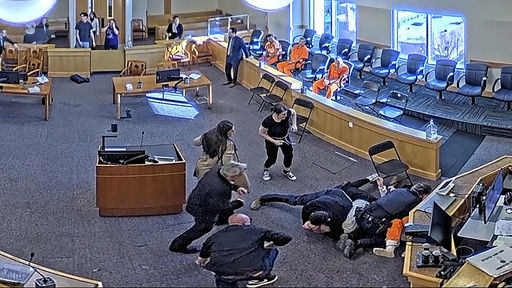 Chaos erupts in New Mexico courtroom as three individuals confront homicide defendant