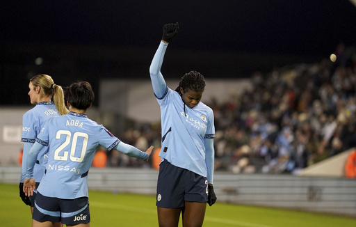 Shaw raises Black Power fist after scoring for Man City Women amid racist harassment