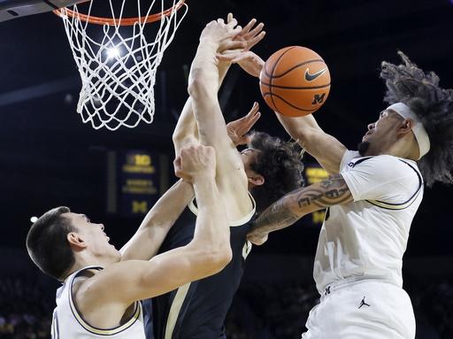 Wolf contributes 15 points as No. 20 narrowly defeats No. 7 Purdue 75-73