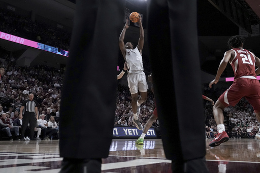 Taylor scores 18 as No. 8 Texas A&M defeats Arkansas 69-61