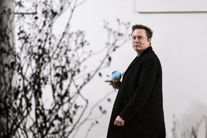 Washington, DC - February 19 : Elon Musk carries a stuffed Air Force One as he walks back to the West Wing along the colonnade after returning to the White House on Marine One with President Donald J Trump on Wednesday, Feb 19, 2025 in Washington, DC. (Photo by Jabin Botsford/The Washington Post via Getty Images)