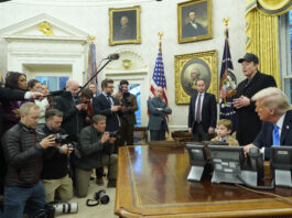 Elon Musk speaks during an event in the Oval Office as President Donald Trump and Musk's son X Æ A-Xii, listen at the White House, Tuesday, Feb. 11, 2025, in Washington. (Photo/Alex Brandon)