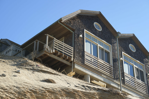 A lavish residence is on the brink of collapsing into Cape Cod Bay. Will there be any intervention?