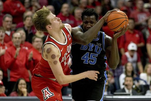 Saunders nets 23 points, hitting 2 key free throws as BYU edges No. 19 Arizona 96-95