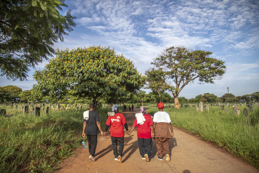 A gym located in a Zimbabwe graveyard strives to advance beyond mortality with every step