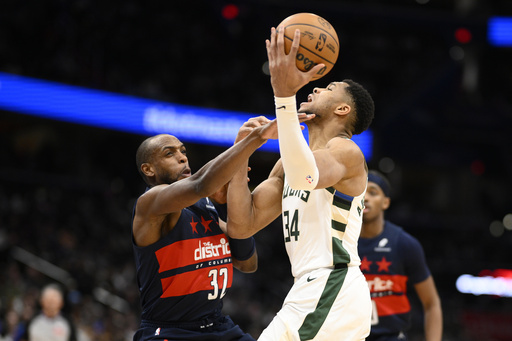 Kuzma nets 19 points as Middleton’s final 3-point attempt falls short in first matchup since the trade between Bucks and Wizards.