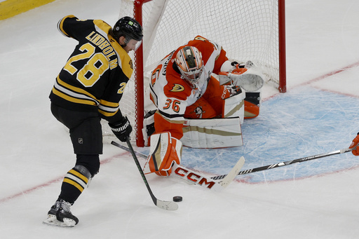 Ducks top Bruins 3-2 in overtime, securing fourth consecutive victory; Goalie Gibson exits due to injury.