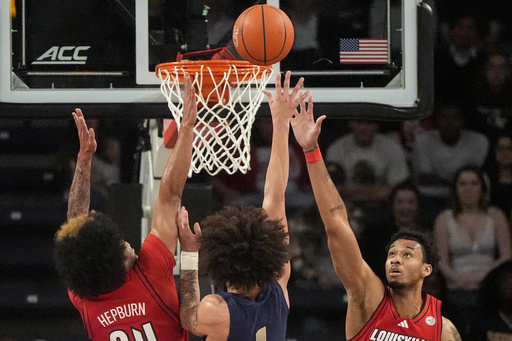 Terry scores 23 as Georgia Tech defeats No. 21 Louisville 77-70, snapping the Cardinals’ 10-game winning streak.