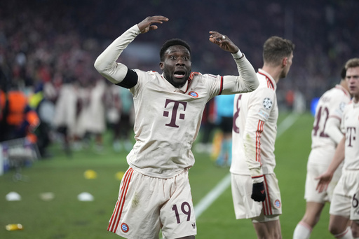 Alphonso Davies celebrates Bayern’s advancement to Champions League knockout stage