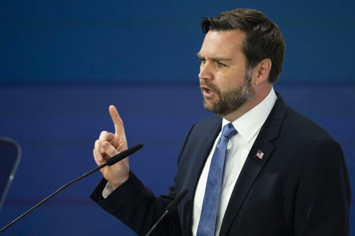 United States Vice-President JD Vance addresses the audience during the Munich Security Conference at the Bayerischer Hof Hotel in Munich, Germany, Friday, Feb. 14, 2025. (AP Photo/Matthias Schrader)