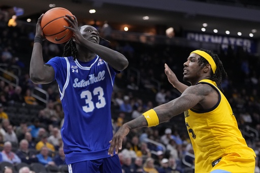 Kam Jones tallies 14 points as No. 16 Marquette comfortably defeats Seton Hall 80-56.