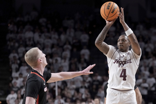 Texas A&M overcomes Georgia 69-53 with a strong second half led by Washington’s 17 points.