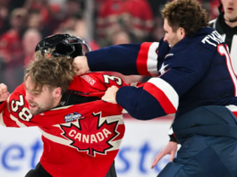 Matthew Tkachuk of Team USA, left, and Brandon Hagel of Team Canada, right, fight during a 4 Nations Face-Off match at the Bell Centre in Montreal, Canada, on Feb. 15, 2025.Minas Panagiotakis—Getty Images