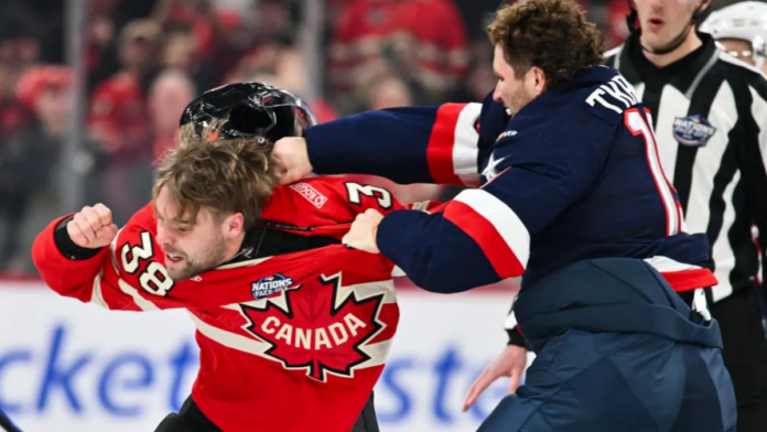 Matthew Tkachuk of Team USA, left, and Brandon Hagel of Team Canada, right, fight during a 4 Nations Face-Off match at the Bell Centre in Montreal, Canada, on Feb. 15, 2025.Minas Panagiotakis—Getty Images