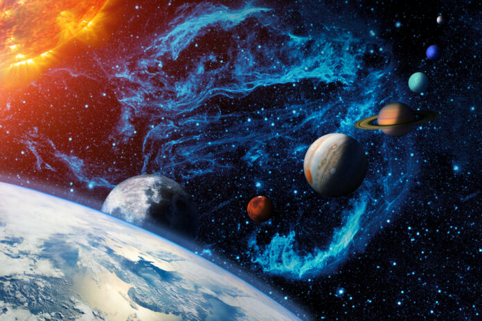 Digital illustration of the Solar system. Sun, Earth and planetary Moon, Mars, Jupiter, Saturn, Uranus, Neptune and the dwarf Pluto. A row of planets and a stellar nebula in outer space. Clipping path included for the foreground objects. Opacity and bump textures for the earth and other planets map prepared via images from www.nasa.gov. Earth texture: