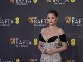 Selena Gomez poses for photographers upon arrival at the 78th British Academy Film Awards, BAFTA's, in London, Sunday, Feb. 16, 2025. (Photo by Joel C Ryan/Invision/AP)