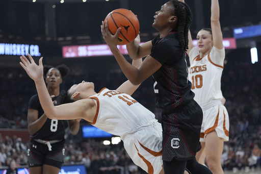 Fourth-ranked Texas defeats second-ranked South Carolina, creating a three-way tie for first place in SEC rankings.