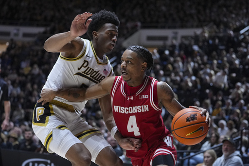 Wisconsin, ranked 16th, comes together following Kamari McGee’s dismissal and beats 7th-ranked Purdue 94-84.