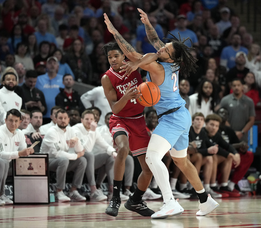 McMillian’s clutch free throws in overtime propel No. 22 Texas Tech to an 82-81 victory over No. 6 Houston.