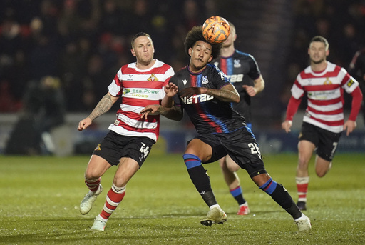 Crystal Palace advances to the FA Cup fifth round following victory over Doncaster.