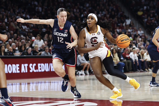 Azzi Fudd leads No. 7 UConn to a dominant 87-58 victory over No. 4 South Carolina, snapping their 71-game home winning streak.