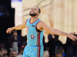 Golden State Warriors guard Stephen Curry celebrates after scoring during the NBA All-Star basketball game Sunday, Feb. 16, 2025, in San Francisco. (AP Photo/Godofredo A. Vásquez)