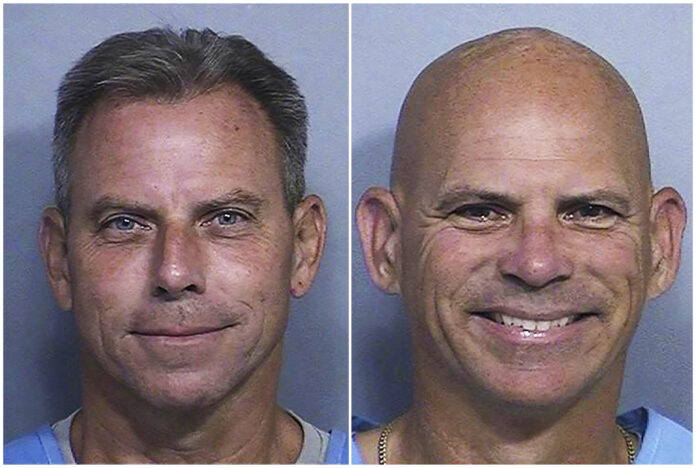 FILE - This combination of two booking photos provided by the California Department of Corrections shows Erik Menendez, left, and Lyle Menendez. (California Dept. of Corrections via AP, File)