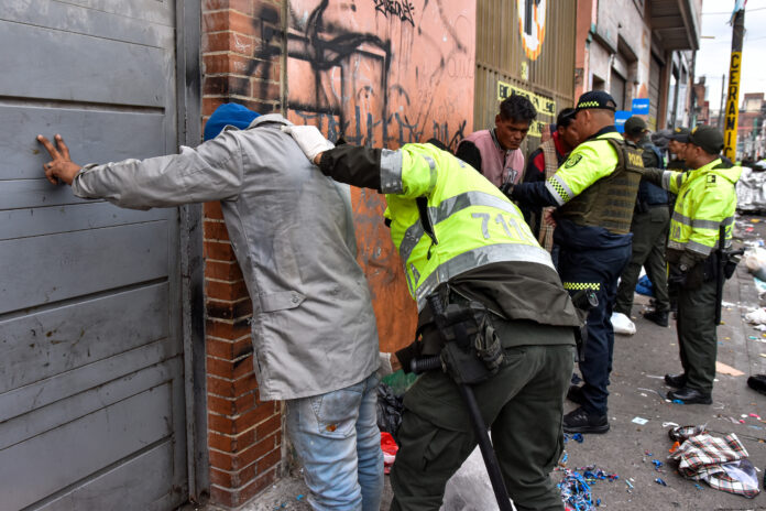 Colombia's police and military perform an operation against microtrafficking in the San Bernardo neigborhood to reduce crime and increase safeness in the downtown area of Bogota, Colombia on May 3, 2024. (Photo by: Cristian Bayona/Long Visual Press/Universal Images Group via Getty Images)