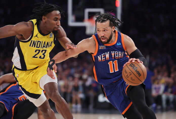 New York, N.Y.: New York Knicks guard Jalen Brunson (11) dribbles against Indiana Pacers forward Aaron Nesmith (23) in the 2nd quarter in game 5 of an NBA playoff Eastern Conference Semi-final round,May 14, 2024, at Madison Square Garden. (Photo by J. Conrad Williams, Jr./Newsday RM via Getty Images)