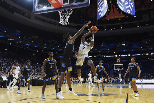 Eric Dixon nets 23 points as Villanova triumphs 81-66 against No. 16 Marquette