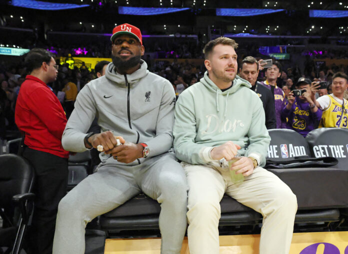 LOS ANGELES, CALIFORNIA - FEBRUARY 8: LeBron James #23 and Luka Doncic #77 before the game against Indiana Pacers at Crypto.com Arena on February 8, 2025 in Los Angeles, California. NOTE TO USER: User expressly acknowledges and agrees that, by downloading and or using this photograph, User is consenting to the terms and conditions of the Getty Images License Agreement. (Photo by Kevork Djansezian/Getty Images)