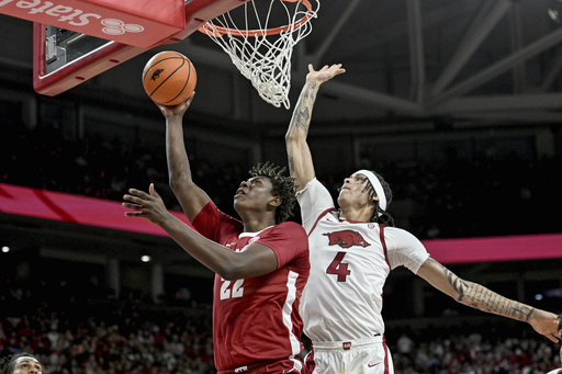 No. 3 Alabama edges out Arkansas 85-81 with 15 points from Nelson and Youngblood.