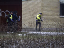 Police at the scene of an incident at Risbergska School, in Örebro, Sweden, Tuesday, Feb. 4, 2025. (Kicki Nilsson/TT News Agency via AP)