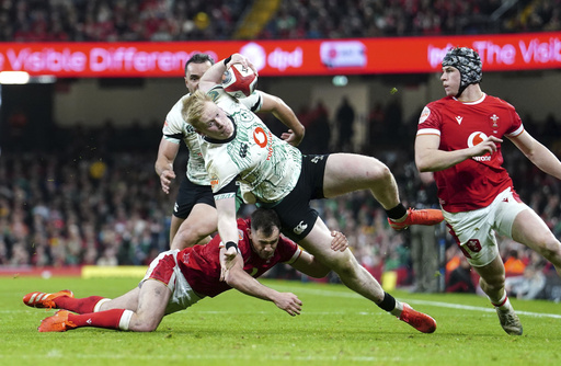 Ireland secures 27-18 victory over Wales, keeping Six Nations title hopes alive with another defeat for their rivals.