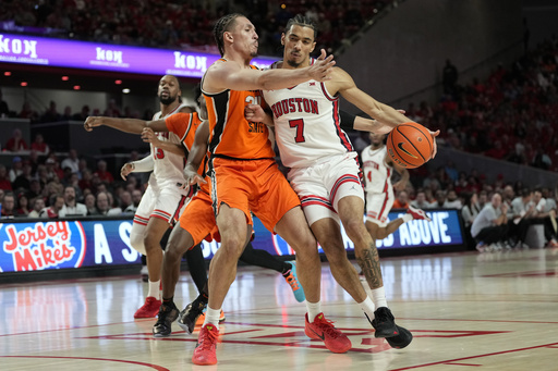 Cryer nets 18 points, guiding No. 5 Houston to a 72-63 victory against Oklahoma State.