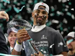 NEW ORLEANS, LOUISIANA – FEBRUARY 09: Jalen Hurts #1 of the Philadelphia Eagles celebrates with the Vince Lombardi Trophy after defeating the Kansas City Chiefs 40-22 to win Super Bowl LIX at Caesars Superdome on February 09, 2025 in New Orleans, Louisiana. (Photo by Jamie Squire/Getty Images)