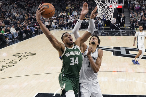 Antetokounmpo excited to team up with new players while being careful about his calf injury.