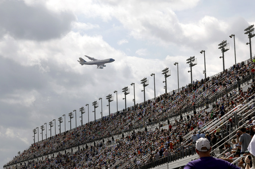 Air Force One with President Donald Trump on board flies over the scoring tower at the NASCAR Daytona 500 auto race as it flies near Daytona International Speedway, Sunday, Feb. 16, 2025, in Daytona Beach, Fla. (AP Photo/Chris O'Meara)