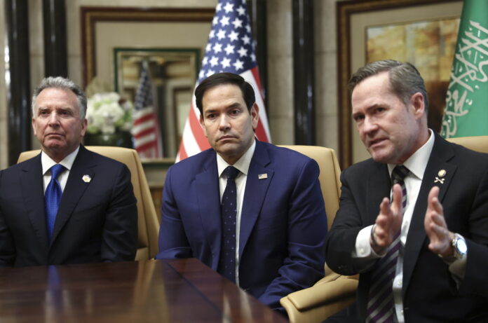 U.S. Secretary of State Marco Rubio, U.S. National Security Advisor Mike Waltz and U.S. Middle East envoy Steve Witkoff attend an interview after meeting with Russian Foreign Minister Sergei Lavrov and Russian President Vladimir Putin's foreign policy advisor Yuri Ushakov, at Diriyah Palace, in Riyadh, Saudi Arabia, Tuesday, Feb. 18, 2025. (Evelyn Hockstein/Pool Photo via AP)