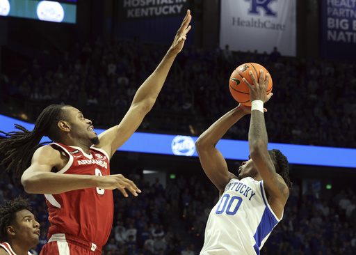 Thiero tallies 22 points versus old team as Arkansas defeats No. 12 Kentucky 89-79.