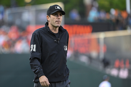 MLB dismisses umpire Pat Hoberg for sharing gambling account details with a friend who wagered on baseball games.