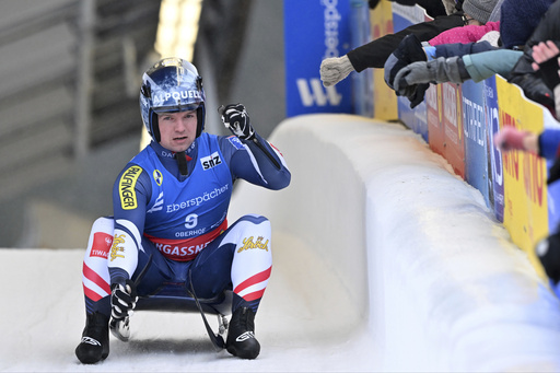 Kindl achieves historic victory in luge with a pair of wins; Friedrich and Buckwitz secure bobsled championship titles.