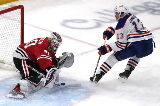 McDavid delivers flawless assist in overtime, leading Oilers to 4-3 victory over Blackhawks