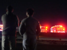 Emergency equipment stages at Gravelly Point, north of Ronald Reagan Washington National Airport, along the Potomac River, Wednesday, Jan. 29, 2025, in Arlington, Va. (AP Photo/Mark Schiefelbein)