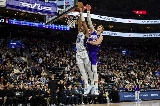 Sexton tallies 22 points as Jazz defeat Magic 113-99, ending their 8-game skid.