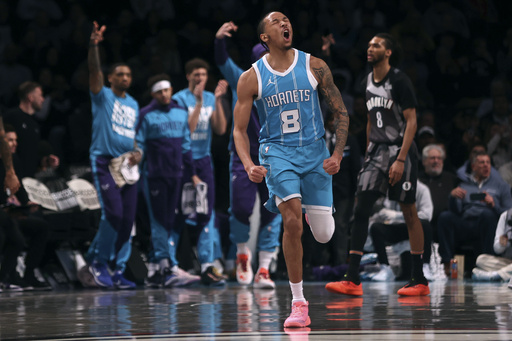 Nets secure victory over Hornets 97-89 after LaMelo Ball exits with ankle injury.