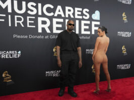 Kanye West, left, and Bianca Censori arrive at the 67th annual Grammy Awards on Sunday, Feb. 2, 2025, in Los Angeles. (Photo by Jordan Strauss/Invision/AP)