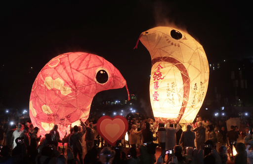 Thousands in Taiwan and China mark the Lantern Festival with optimism and rice dumplings